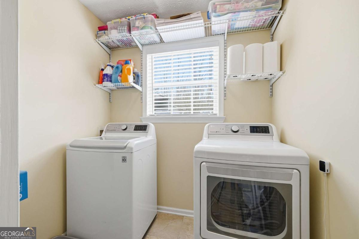134 Nicholson Lane Talking Rock, GA 30175 - Photo 17 of 72 a utility room with dryer and washer