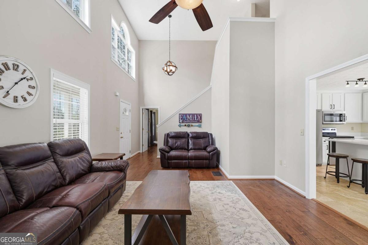 134 Nicholson Lane Talking Rock, GA 30175 - Photo 21 of 72 a living room with furniture or couch and a large window