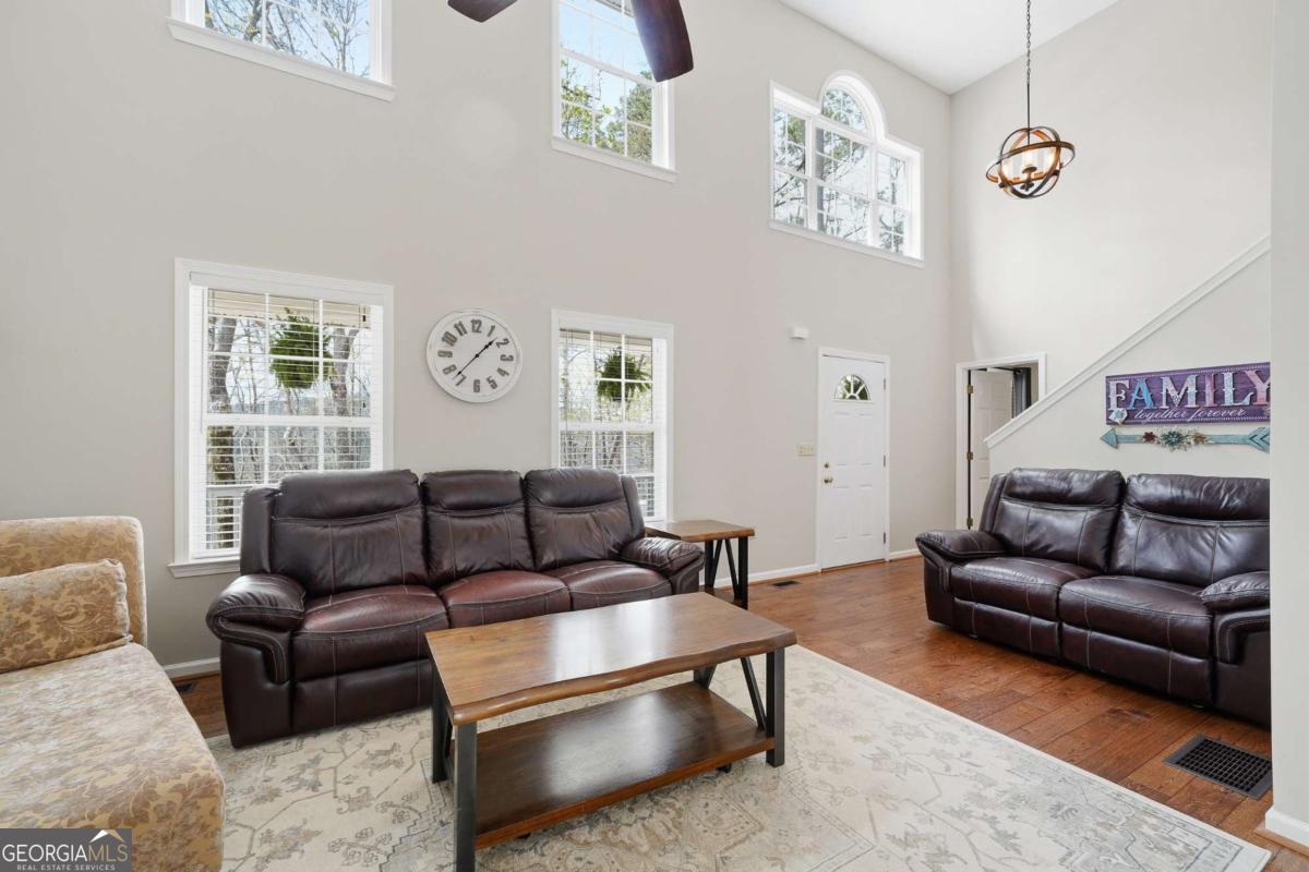 134 Nicholson Lane Talking Rock, GA 30175 - Photo 22 of 72 a living room with furniture and a window