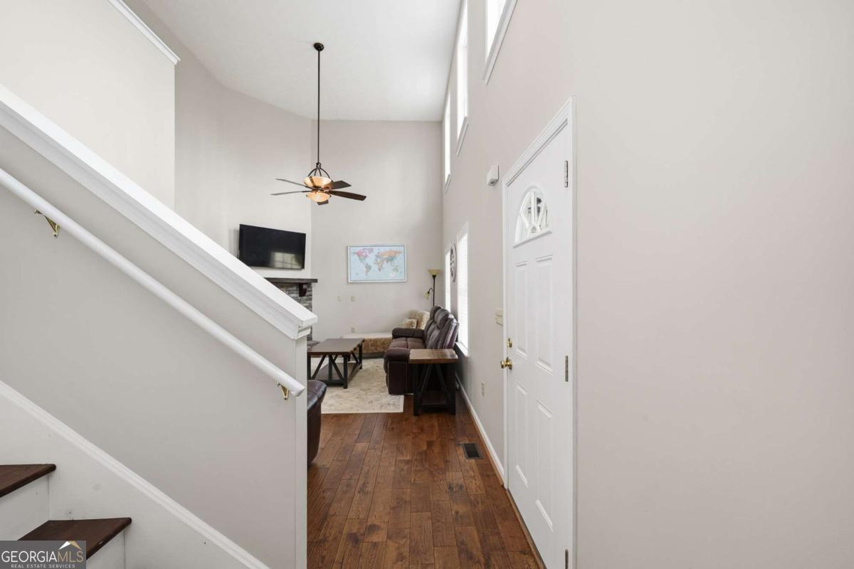 134 Nicholson Lane Talking Rock, GA 30175 - Photo 23 of 72 a hallway with a white stove top oven and fireplace