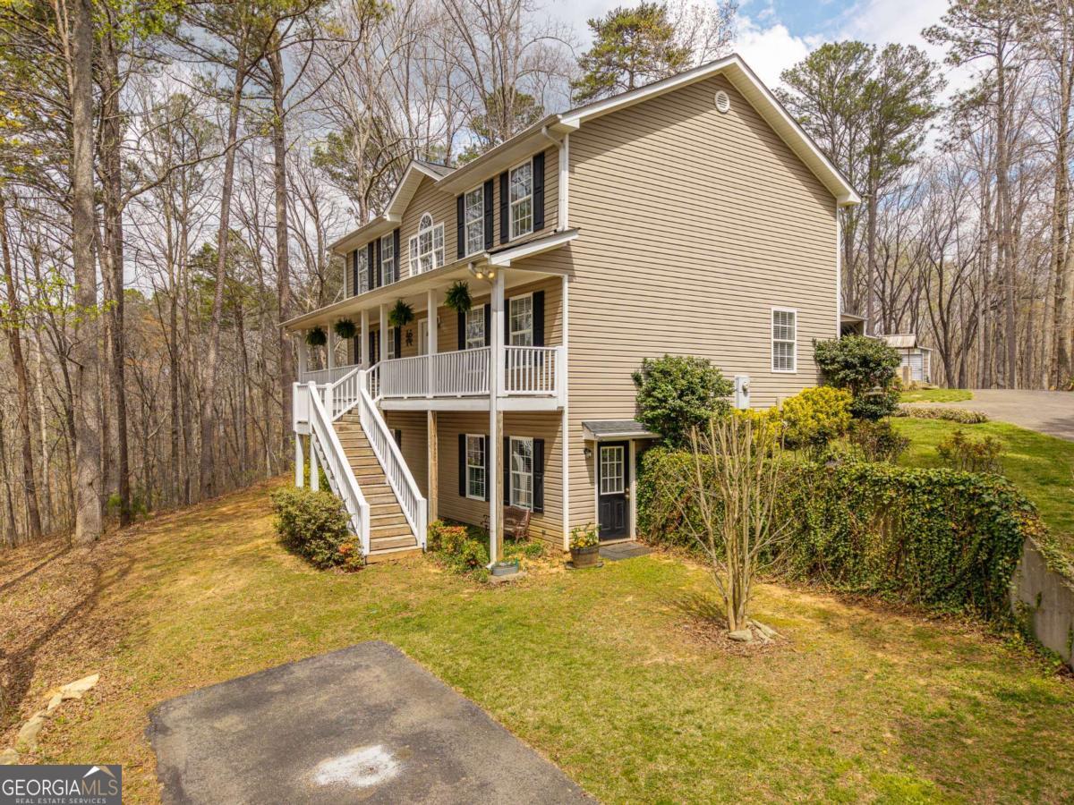 134 Nicholson Lane Talking Rock, GA 30175 - Photo 53 of 72 a view of a house with backyard