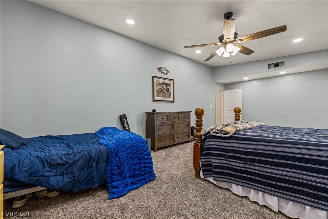 750 Leming Avenue Overton, NV 89040 - Photo 49 of 82 This cozy bedroom features comfortable flooring and ample ceiling height for a relaxing retreat.