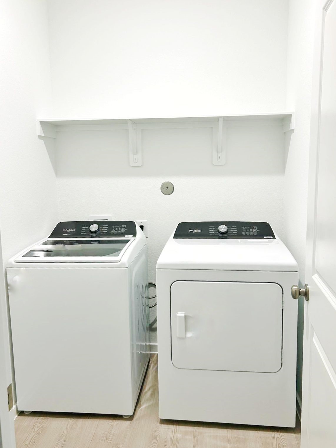 14973 Rustic Moon Road Conroe, TX 77302 - Photo 18 of 22 a utility room with dryer and washer