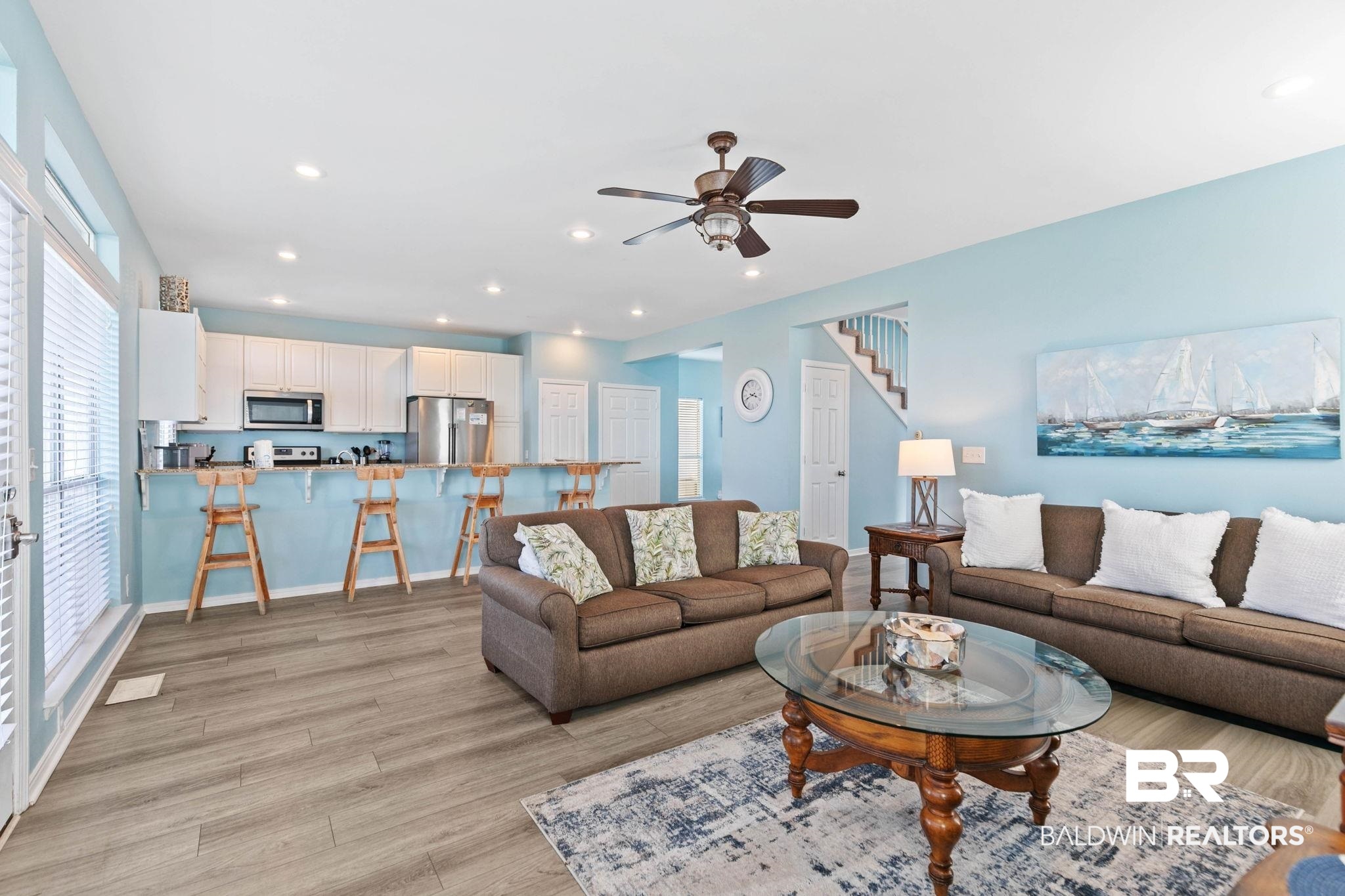 545 Plantation Road, Unit 3 Gulf Shores, AL 36542 - Photo 9 of 54 Living area with recessed lighting, light wood finished floors, ceiling fan, and stairway