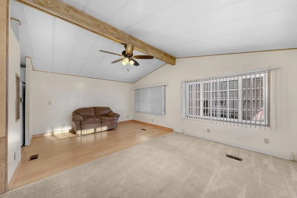 11949 Riverside Drive, Unit 133 Lakeside, CA 92040 - Photo 7 of 28 a view of a livingroom with furniture and windows