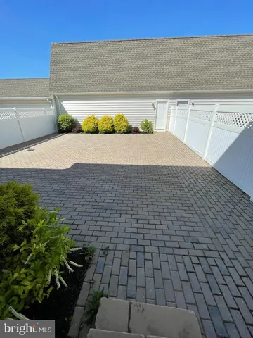 a view of a backyard of the house