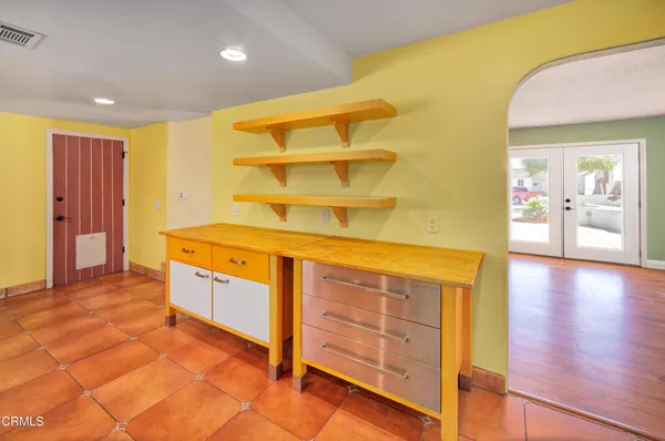 a view of a kitchen with a sink