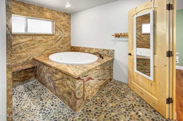 a bathroom with a sink and a shower