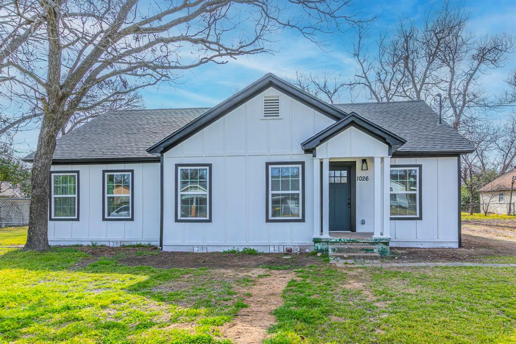 1026 La Clede Street Bellmead, TX 76705 - Photo 1 of 27 a backyard of a house with yard and glass windows