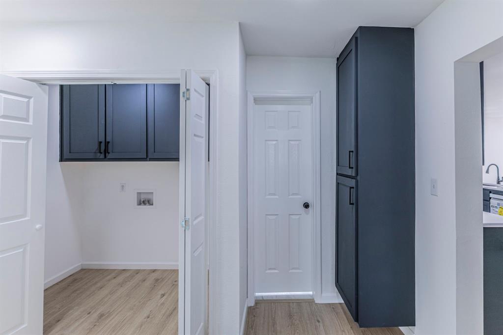 1026 La Clede Street Bellmead, TX 76705 - Photo 19 of 27 a view of hallway with wooden floor