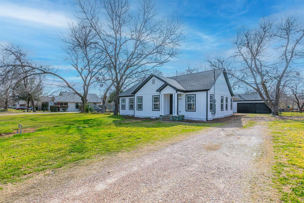 1026 La Clede Street Bellmead, TX 76705 - Photo 20 of 27 a house with swimming pool in front of it
