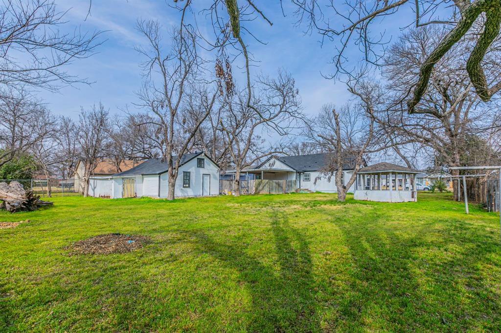 1026 La Clede Street Bellmead, TX 76705 - Photo 24 of 27 a view of yard with swimming pool and green space