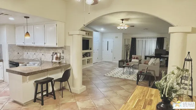 a kitchen with a stove and a refrigerator