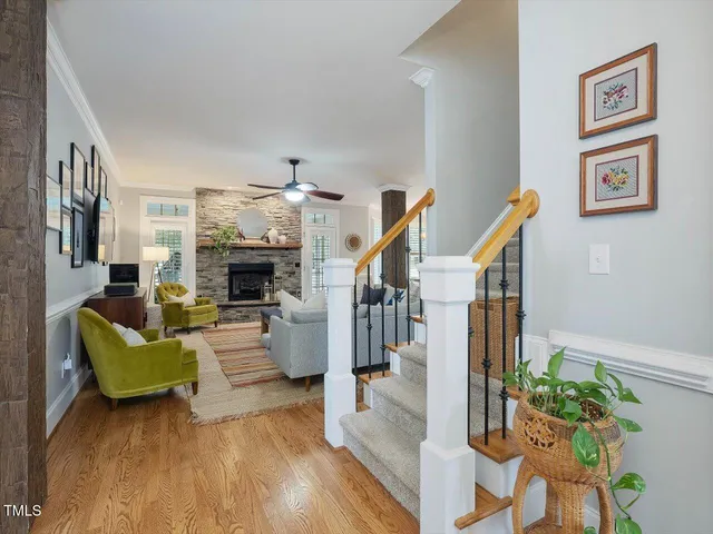 a kitchen with stainless steel appliances granite countertop a stove a sink island and a refrigerator