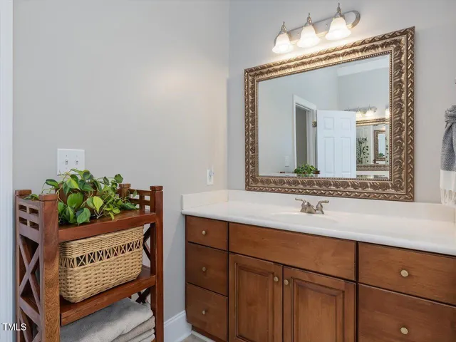 a bedroom with two beds and a large window