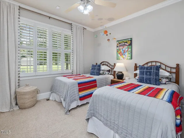 a bathroom with a double vanity sink mirror and double
