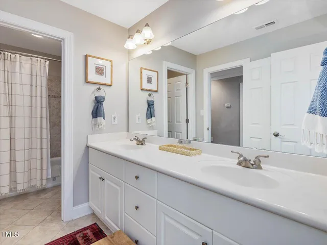 a building outdoor space with patio furniture and potted plants