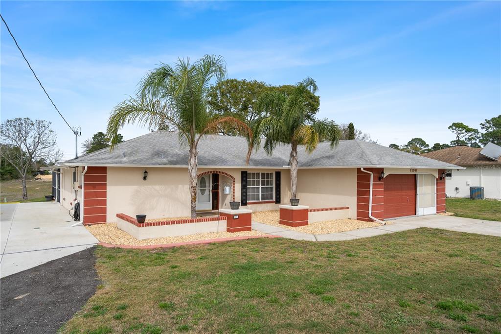 13101 Delbarton Street Spring Hill, FL 34609 - Photo 2 of 44