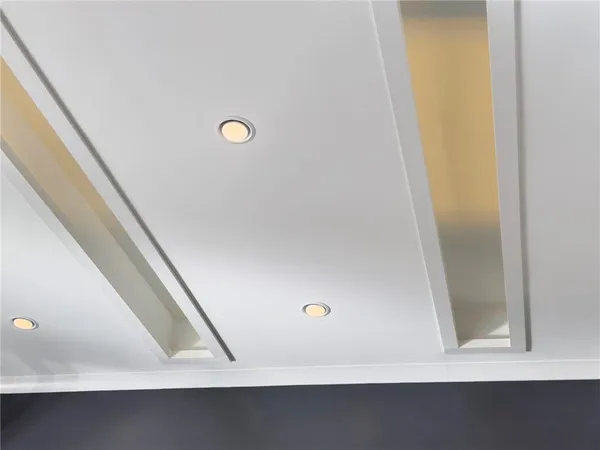 a kitchen with a stove and a refrigerator