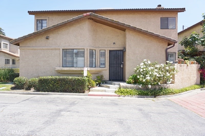 1604 Vía Rosa Baldwin Park, CA 91706 - Photo 1 of 27 a view of a house with a yard and plants