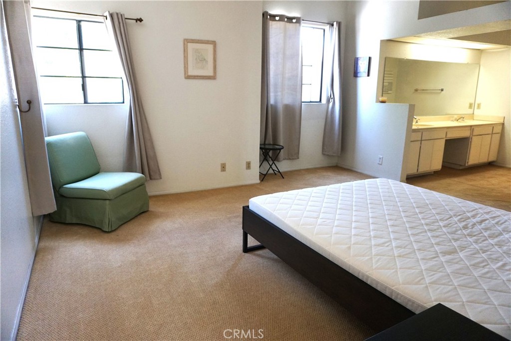 1604 Vía Rosa Baldwin Park, CA 91706 - Photo 10 of 27 a bedroom with a bed and a couch