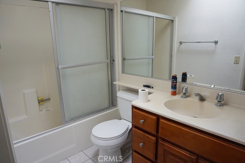 1604 Vía Rosa Baldwin Park, CA 91706 - Photo 17 of 27 a bathroom with a sink toilet and shower