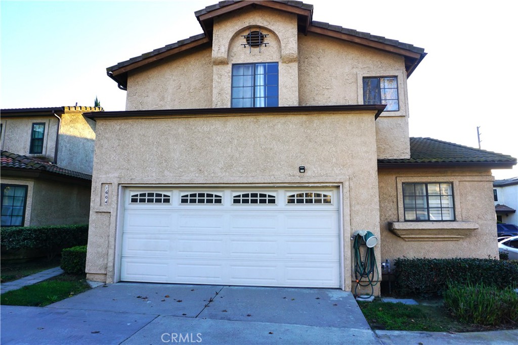 1604 Vía Rosa Baldwin Park, CA 91706 - Photo 22 of 27 a house view with a sink and a yard