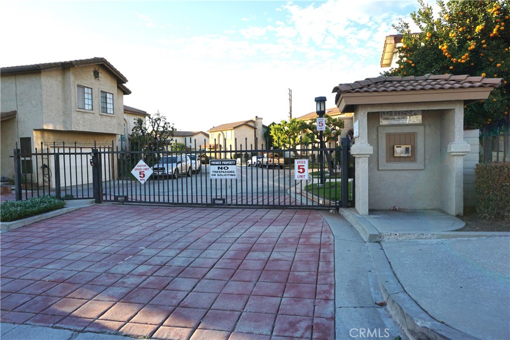 1604 Vía Rosa Baldwin Park, CA 91706 - Photo 26 of 27 a view of a brick house with many windows
