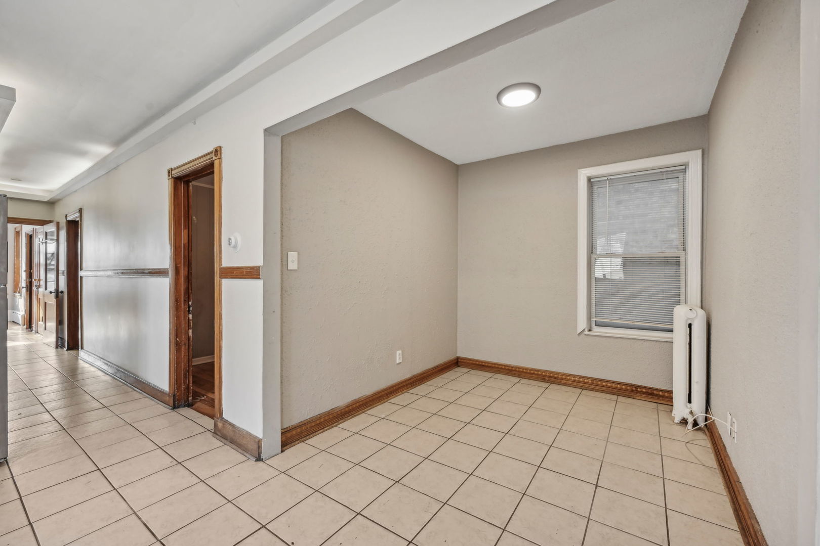 3140 West Pershing Road Chicago, IL 60632 - Photo 17 of 65 a view of an empty room and window