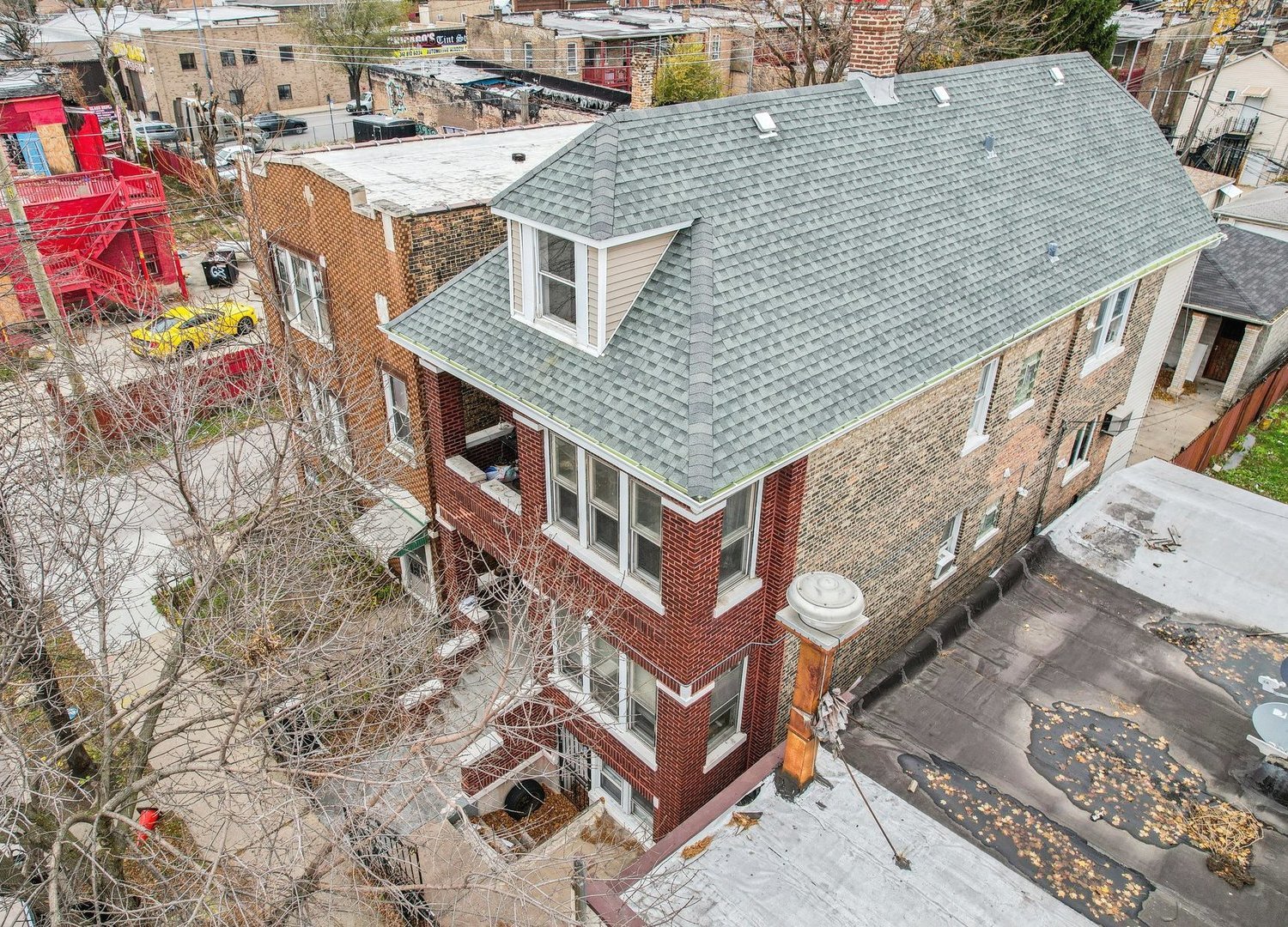 3140 West Pershing Road Chicago, IL 60632 - Photo 3 of 65 a aerial view of a house with balcony and stairs