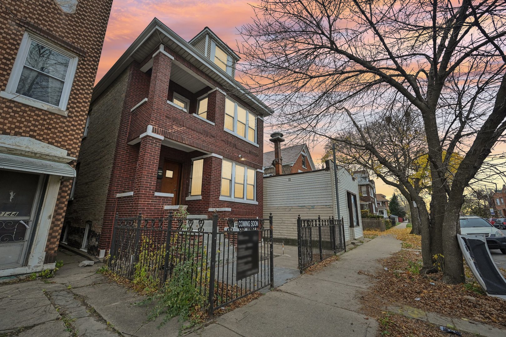 3140 West Pershing Road Chicago, IL 60632 - Photo 61 of 65 a view of a house with a tree in front of it