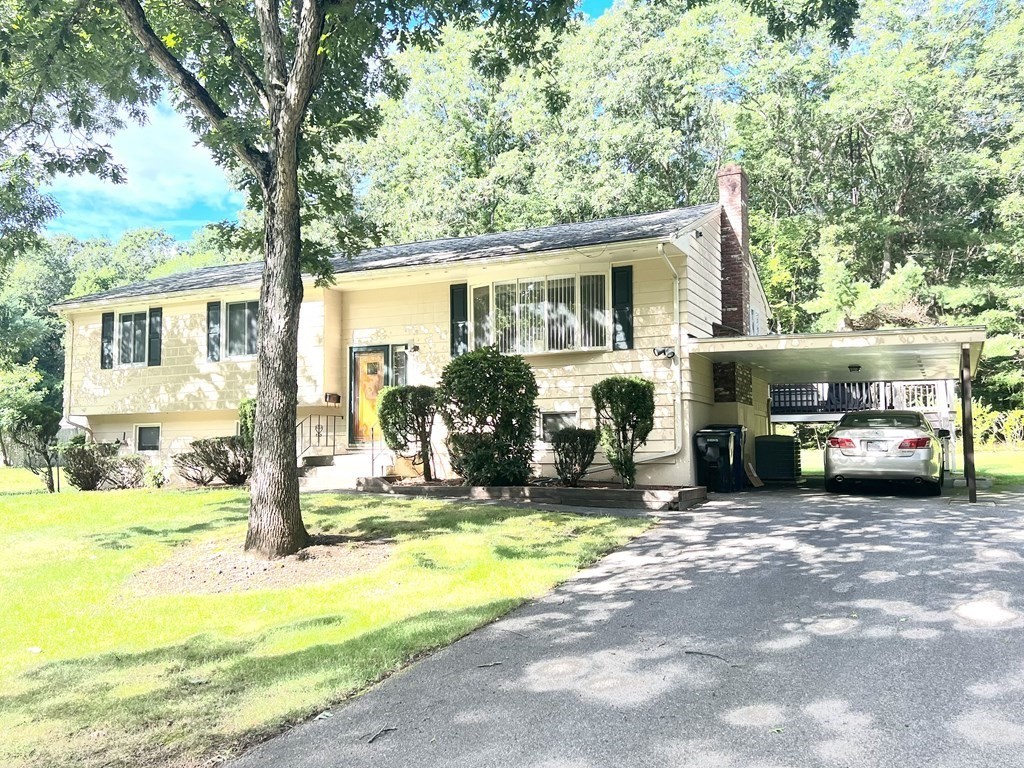 7 Johnson Road Sharon, MA 02067 - Photo 1 of 26 a view of a house with car parked in front of house
