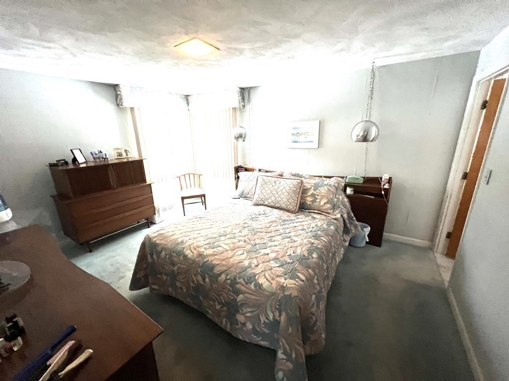 7 Johnson Road Sharon, MA 02067 - Photo 11 of 26 a bedroom with bed and window