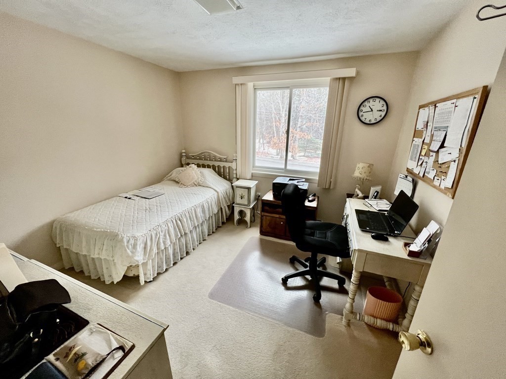 7 Johnson Road Sharon, MA 02067 - Photo 15 of 26 a bedroom with furniture and a window