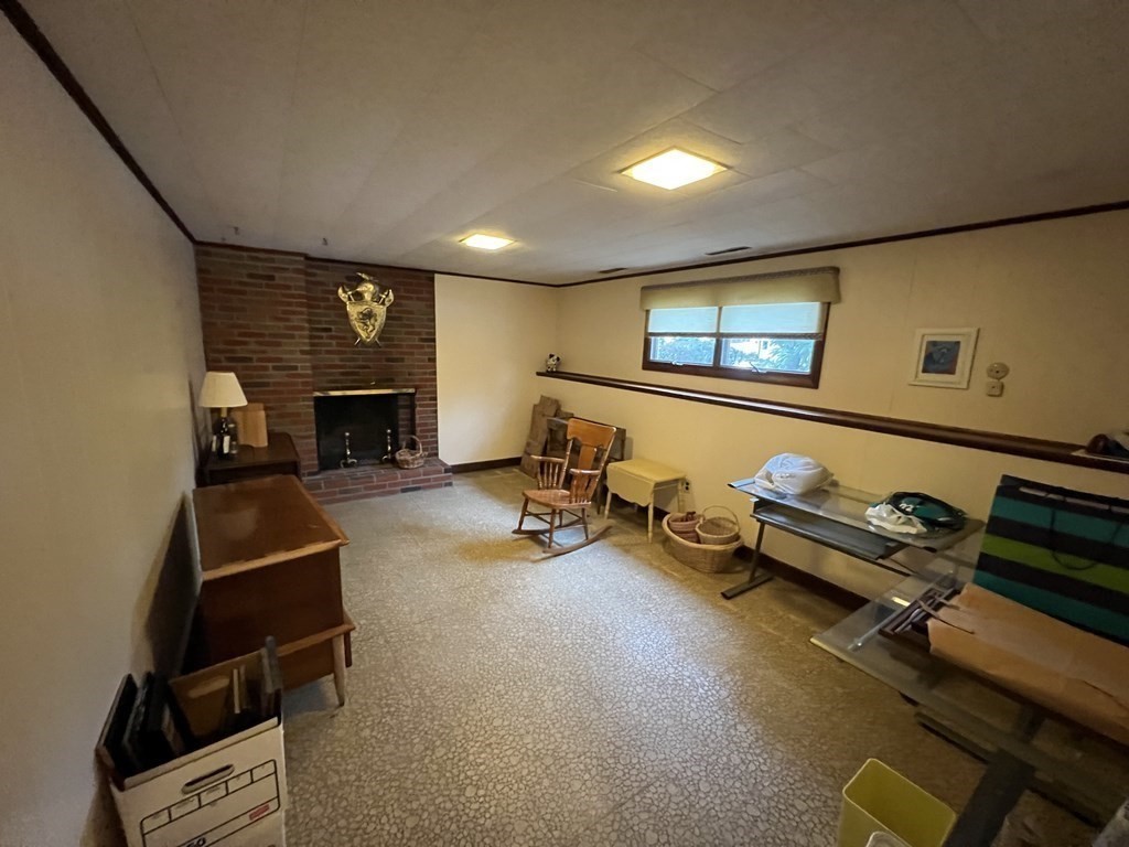 7 Johnson Road Sharon, MA 02067 - Photo 17 of 26 a room with furniture and a flat screen tv