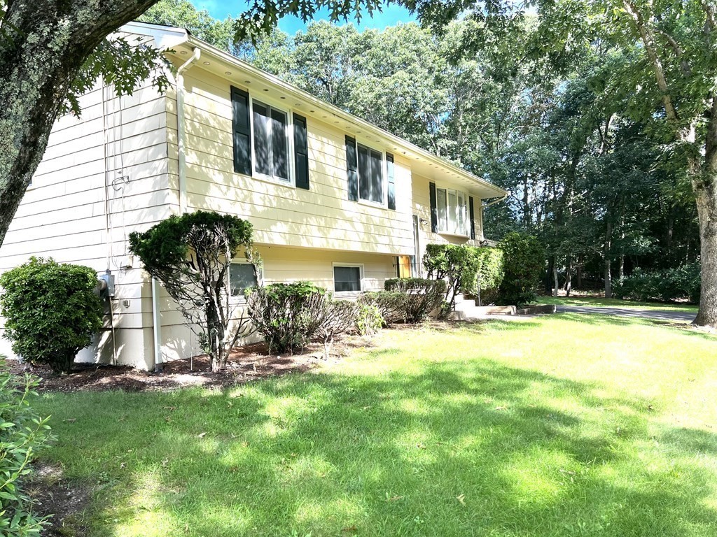 7 Johnson Road Sharon, MA 02067 - Photo 2 of 26 a view of a house with back yard