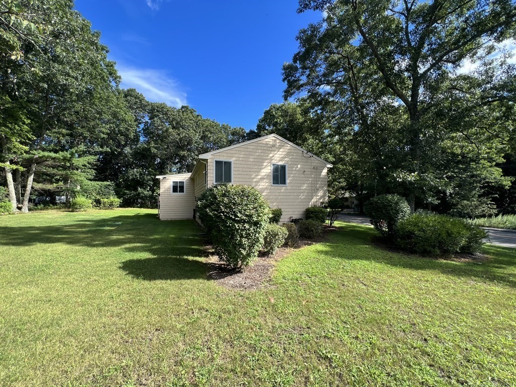 7 Johnson Road Sharon, MA 02067 - Photo 24 of 26 a view of a house with backyard