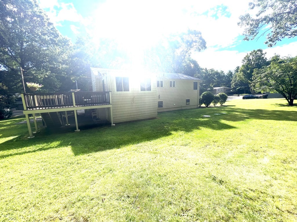 7 Johnson Road Sharon, MA 02067 - Photo 26 of 26 a view of a backyard with a garden and plants