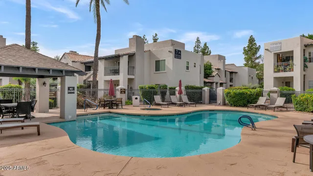 a view of a house with swimming pool