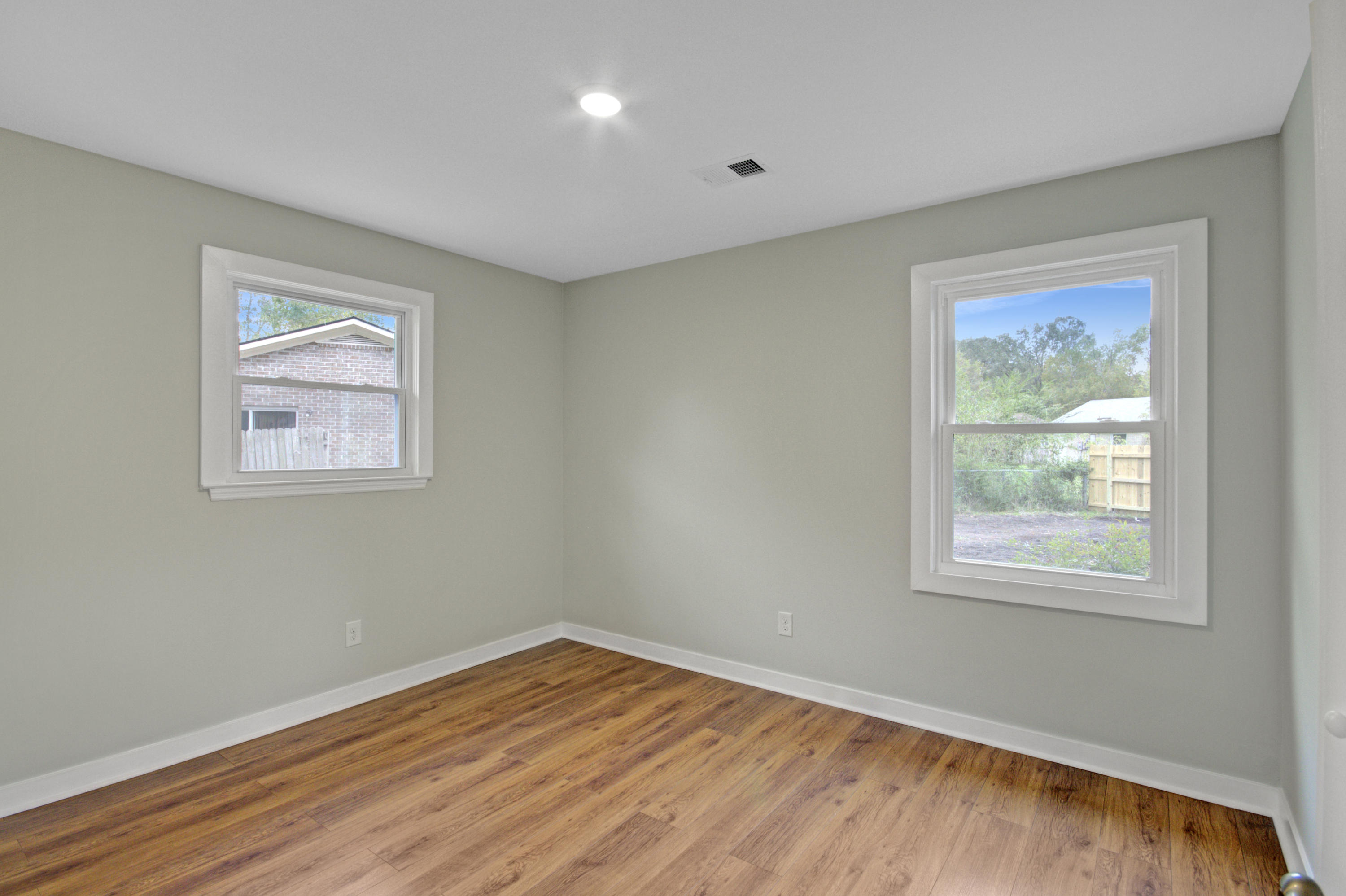 100 Waring Road Summerville, SC 29485 - Photo 13 of 22 Guest Bedroom with Recessed Lighting