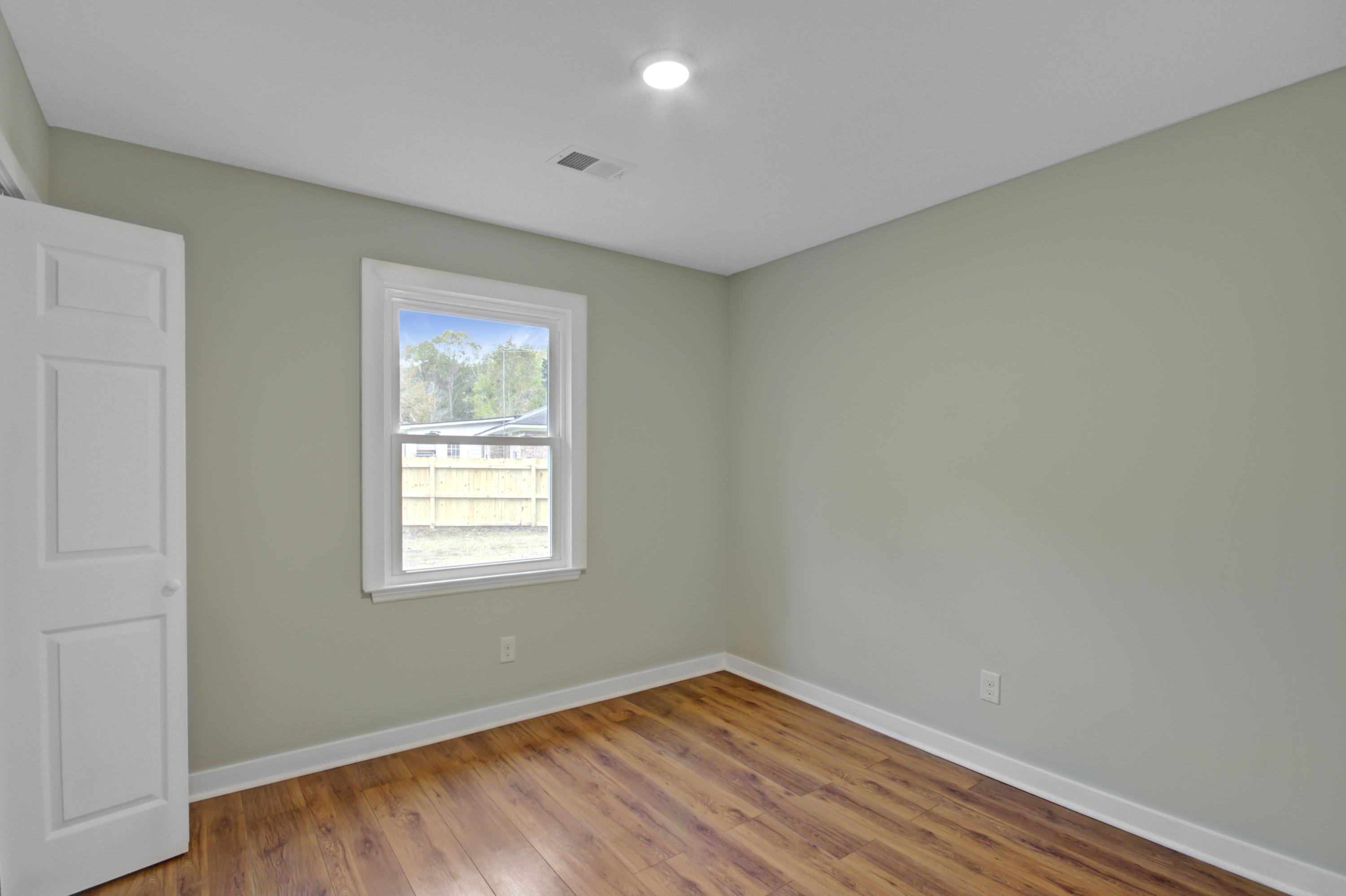 100 Waring Road Summerville, SC 29485 - Photo 14 of 22 Guest Bedroom with Hardwood Floors