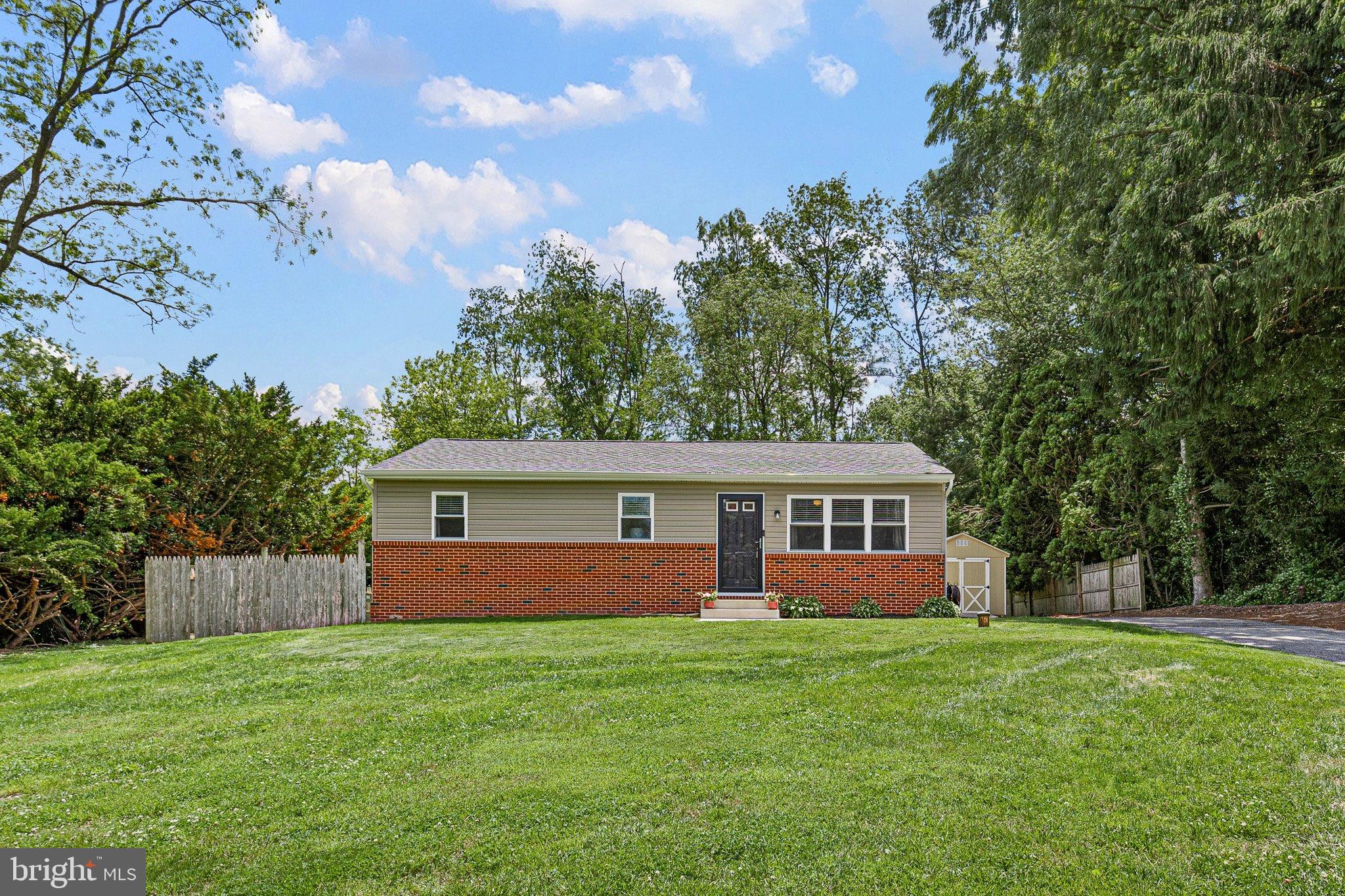 370 Big Elk Chapel Road Elkton, MD 21921 - Photo 2 of 29 a view of a house with a backyard