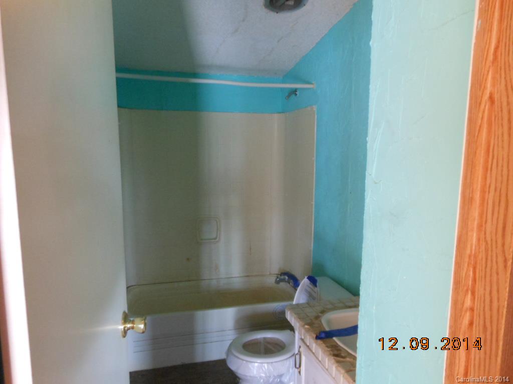 1808 Musselwhite Road Wingate, NC 28174 - Photo 12 of 16 a bathroom with a sink and a toilet