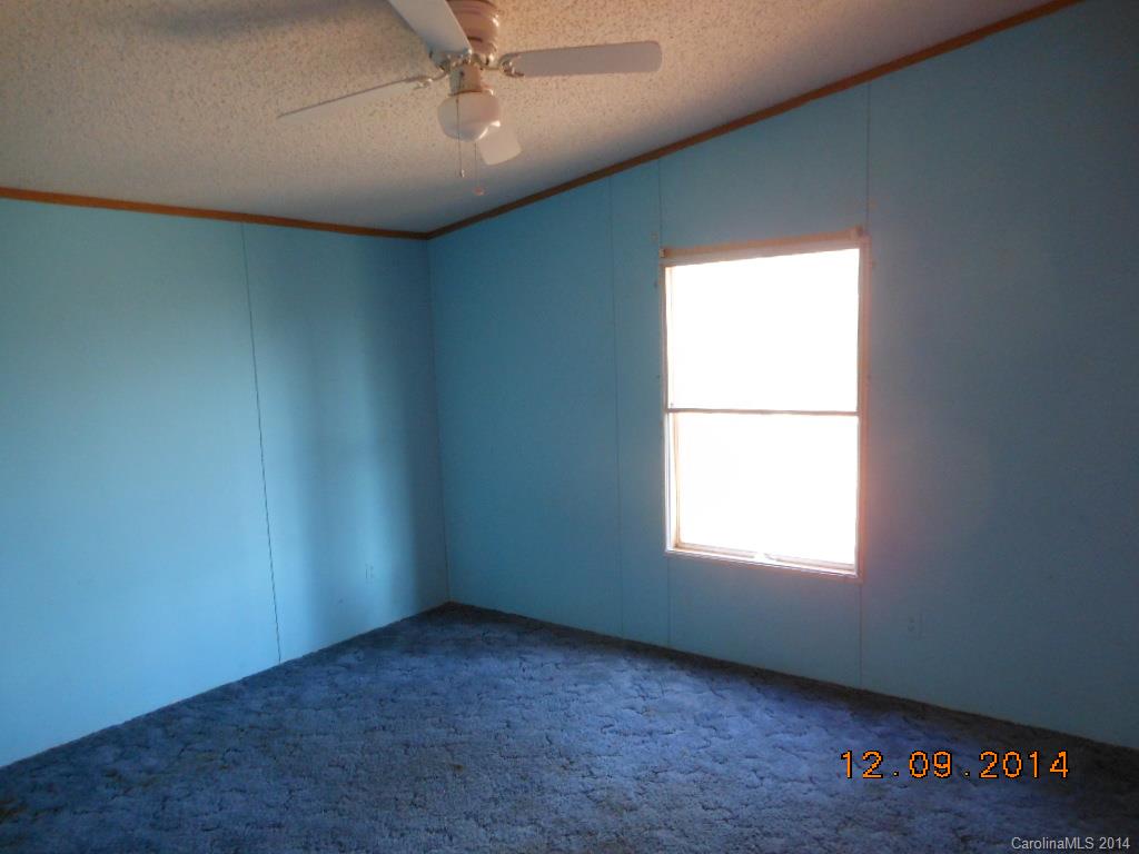 1808 Musselwhite Road Wingate, NC 28174 - Photo 13 of 16 an empty room with a window