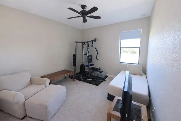 a room with furniture and a window