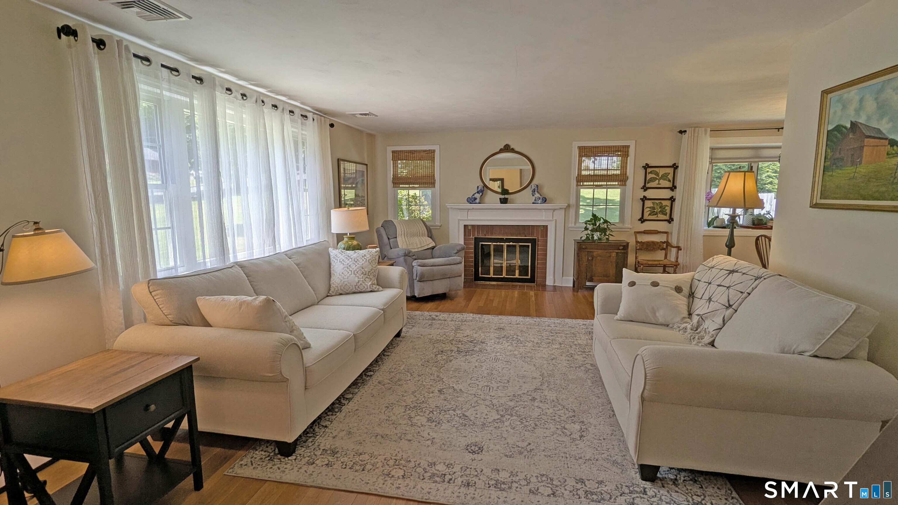 65 Prout Hill Road Middletown, CT 06457 - Photo 3 of 31 Living room with brick fireplace