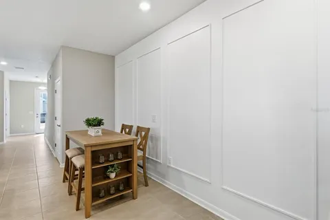 a kitchen with a stove a sink and a refrigerator