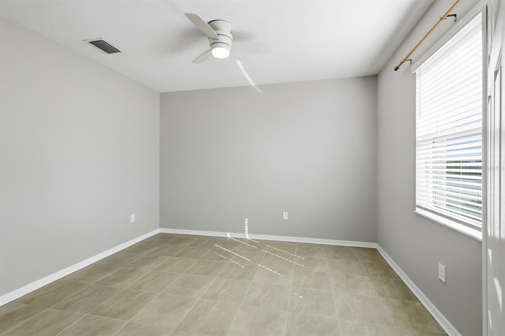 1782 Spreader Lane Sarasota, FL 34240 - Photo 13 of 38 a view of a window in an empty room