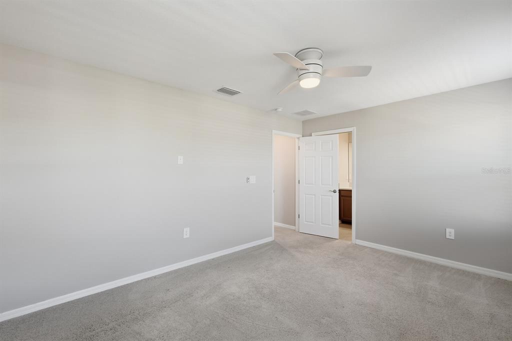 1782 Spreader Lane Sarasota, FL 34240 - Photo 15 of 38 a view of an empty room with a window