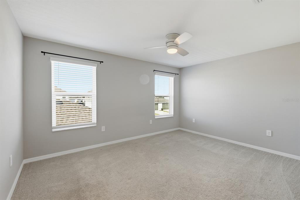 1782 Spreader Lane Sarasota, FL 34240 - Photo 16 of 38 a view of an empty room with a window